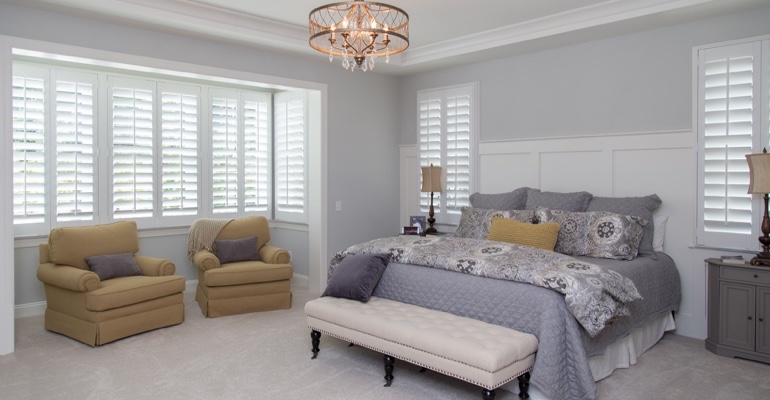 Plantation shutters in San Jose bedroom.